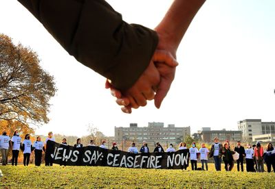 Protesters calling for Sen. Elizabeth Warren to push for a Gaza cease-fire block a Boston bridge