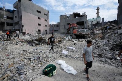 Thousands of bodies lie buried in rubble in Gaza. Families dig to retrieve them, often by hand