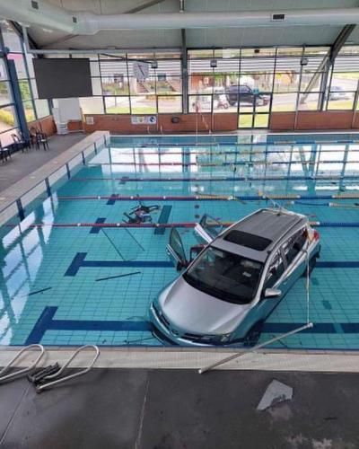 Car crashes into swimming pool during school drop off at Melbourne’s Haileybury college