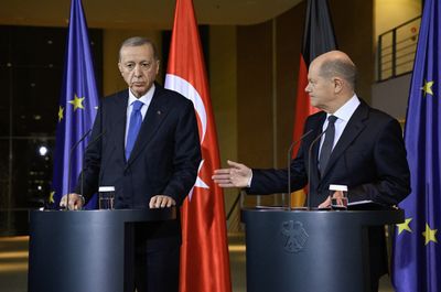 Erdogan in tense talks in Germany as divisions over Gaza war deepen