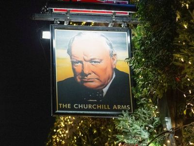 London Pub Lights Up With 150,000 LEDs On 55 Christmas Trees