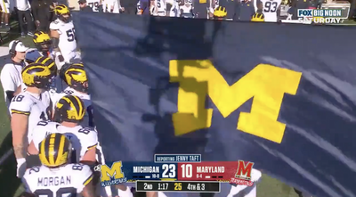 College football fans had so many jokes about Michigan trying to hide its huddle from Fox’s cameras