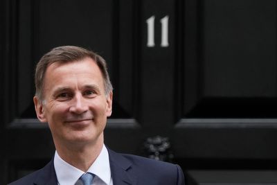 Hunt refuses to rule out shock income tax cut amid warnings of revolt if budget favours rich