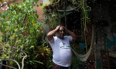 ‘Hell de Janeiro’: scorching heat highlights Brazil’s glaring inequality