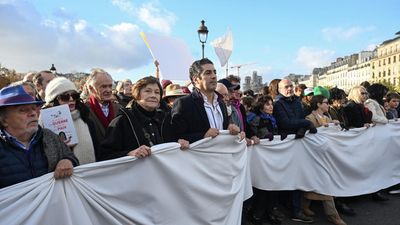 French artists lead a silent Paris march for peace between Israelis and Palestinians