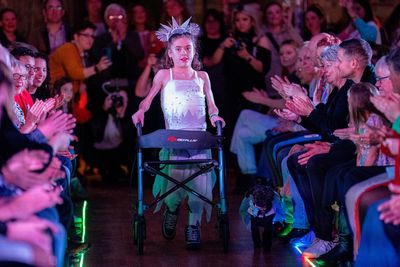 Girl with muscular dystrophy walks runway at Bristol Fashion Show