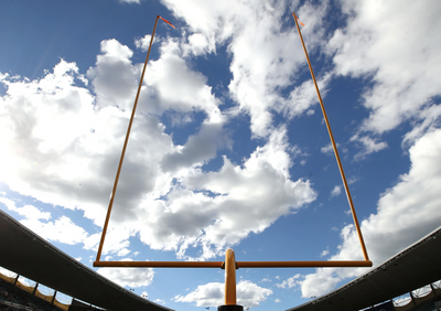 Football coach fired for hosting a baptismal service his players