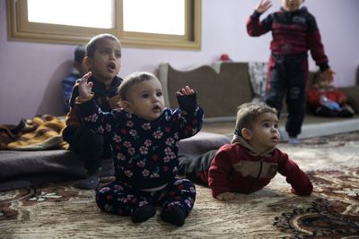 ‘My soul and beating heart’: Orphaned Syrian children find new family