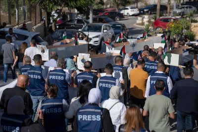 Airstrikes hit home of Gaza photojournalist targeted by pro-Israel media group