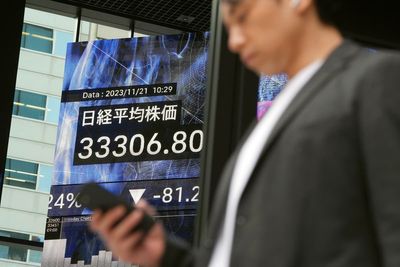 Stock market today: Asian shares trading mixed after Wall Street rally led by Microsoft gains