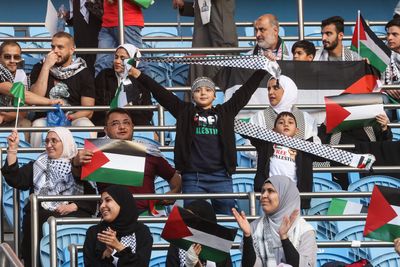 Palestinians, supporters fly flag in emotional World Cup qualifier