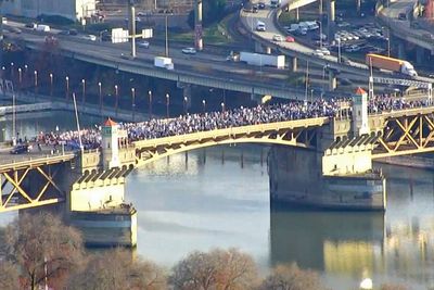 Teachers in Portland, Oregon, march and temporarily block bridge in third week of strike