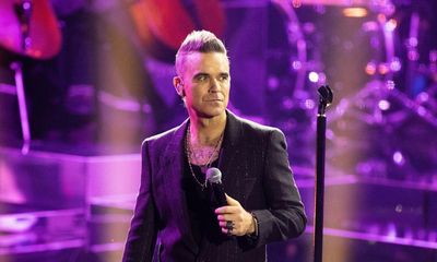 Robbie Williams pays tribute to fan who died at Sydney show: ‘It breaks my heart’