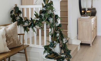 How can I make my entryway feel more Christmassy? Designers share their top tips on easy festive styling
