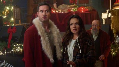 Hallmark Stars Luke Macfarlane And Italia Ricci Talk Getting Inspiration From Will Ferrell's Elf And Teaming Up For Catch Me If You Claus
