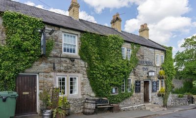 ‘An open fire, the dog snoozing at our feet’: readers’ favourite UK pubs for food