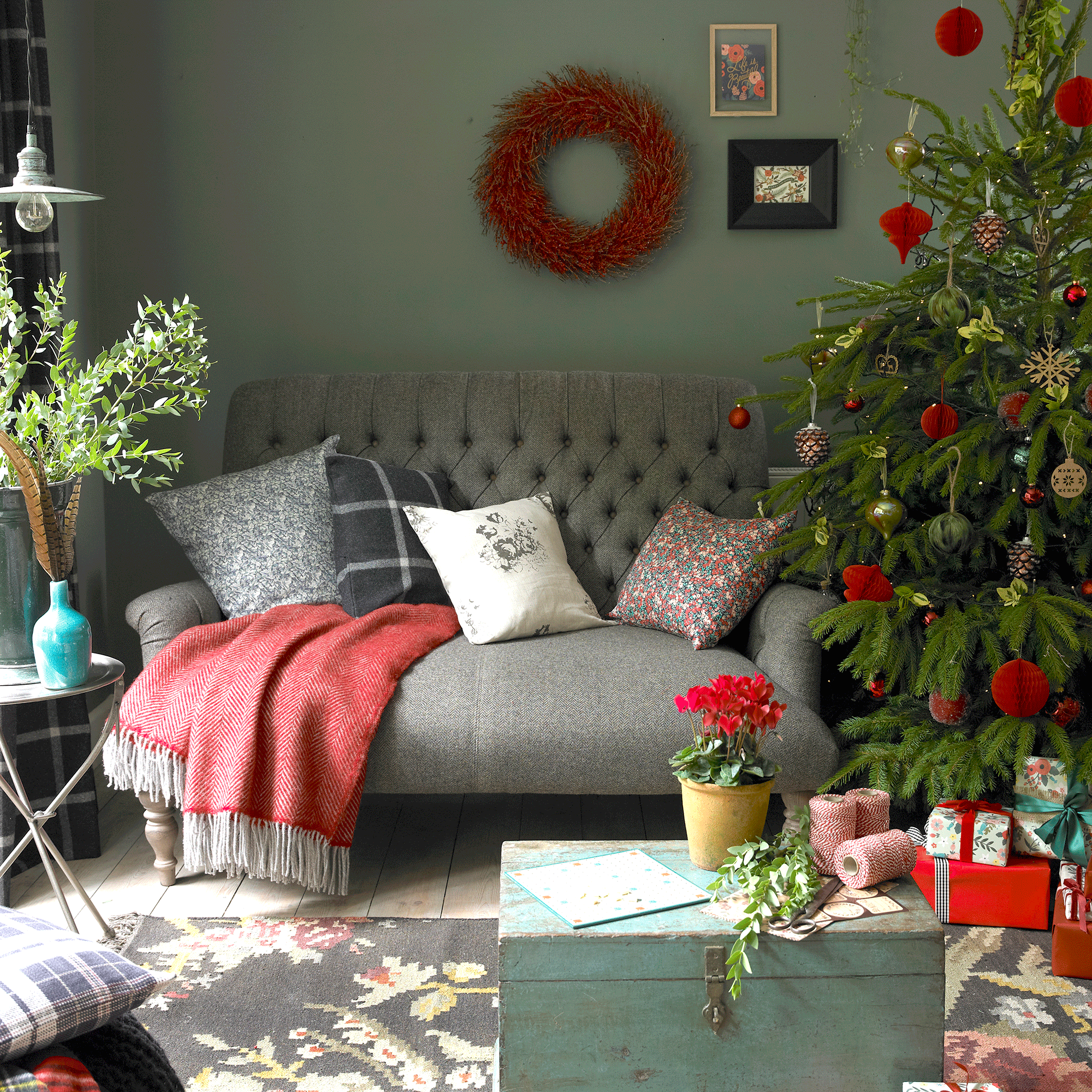 10 style-savvy ways to decorate a small living room for Christmas, according to design experts