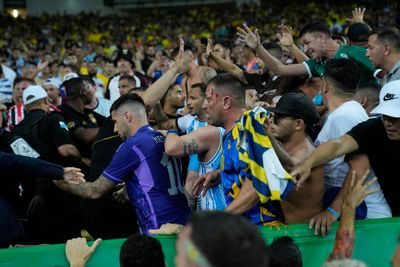 Argentina and Brazil charged by FIFA after fan violence delays World Cup qualifying game at Maracana