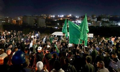 ‘I won’t believe it until I see it’: Palestinians gather to greet freed prisoners