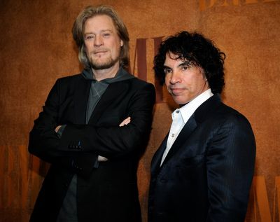 Daryl Hall is suing John Oates over plan to sell stake in joint venture. A judge has paused the sale