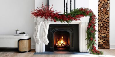 This genius hack for hanging Christmas garlands is going to change how you decorate your fireplace from now on