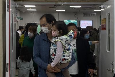 China says a surge in respiratory illnesses is caused by flu and other known pathogens