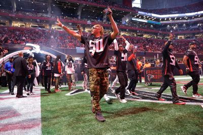 Ludacris drops from ceiling during Falcons-Saints game