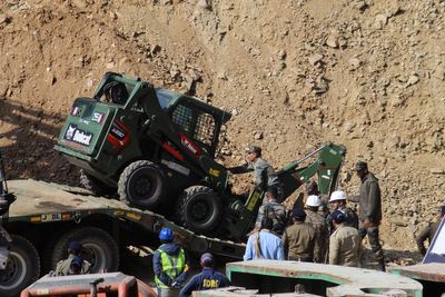 Rescuers attempt manual digging to free 41 Indian workers trapped for over two weeks in tunnel