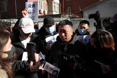 New probe over vanished Malaysia Airlines plane urged in China court