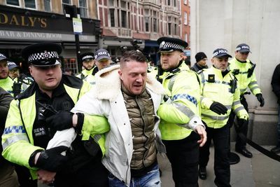 Tommy Robinson charged after arrest at march against antisemitism