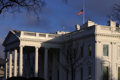 Why are flags being flown at half-staff for Rosalynn Carter?