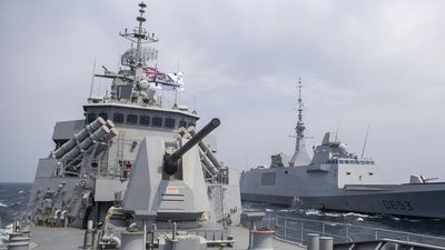 Navy 'comfortable' with response to China warship clash