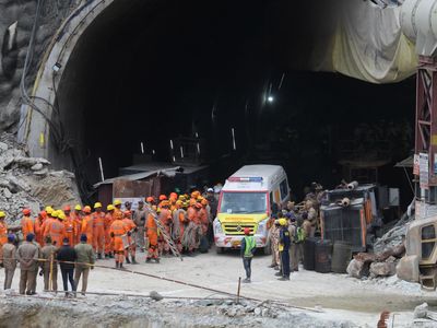Indian rescuers have reached 41 workers trapped in a tunnel for more than 2 weeks