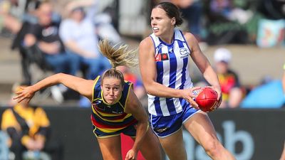 AFLW players join coaches in honouring North's Garner