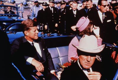 JFK assassination artifacts, including a blood-soaked swatch from the car he was riding in, sell for big dollars at auction
