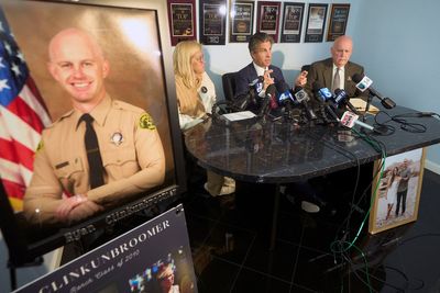 Family of deputy ‘executed’ outside police station files $20m lawsuit
