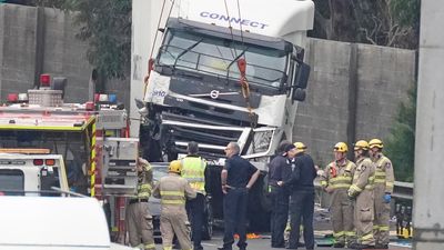 Trucking boss fined over crash that killed four cops
