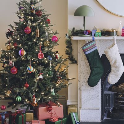 Argos has cut the price on its Christmas decorations - including a 7ft tree for under £35