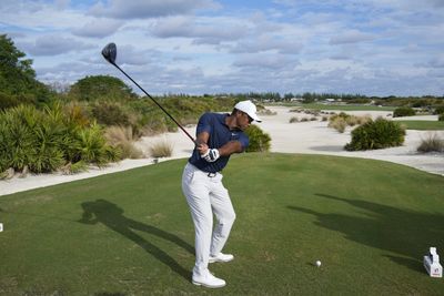 Here’s Tiger Woods striping a tee shot down the fairway during the Hero World Challenge Pro-Am