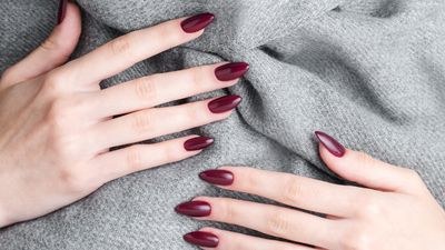 'Black Cherry' is the chicest nail shade to wear for the festive season - here are 5 ways to style it