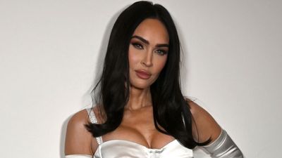 Megan Fox Took Some Glam Photos, And Other Than Her High Slit, They Are A Total Fashion Departure For Her