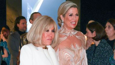 French First Lady Brigitte Macron and Queen Maxima of the Netherlands matched in dazzling white gowns at art exhibit