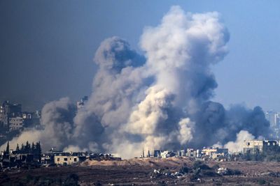 Israel bombs hundreds of targets in Gaza as truce efforts continue