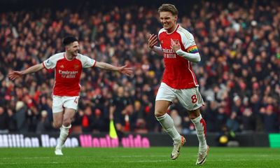 Martin Ødegaard sparkles as Arsenal edge past Wolves to extend lead at top