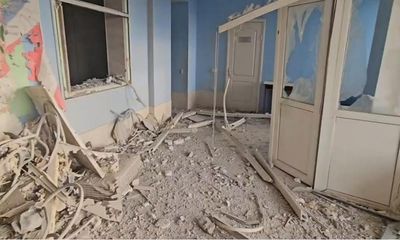 ‘My mum’s books survived Putin’s missiles’: defiance after blast destroys Kherson children’s library
