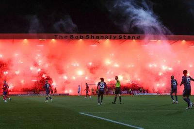 Rangers admit 'regret' over pyro display by fans at Dens Park