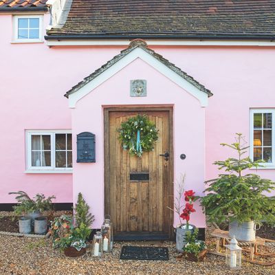This pink cottage in the Suffolk countryside is a dream forever home for Christmas and beyond