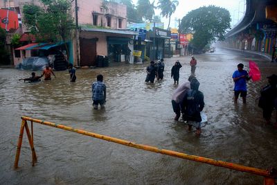 Heavy rains lash India's southern and eastern coasts as they brace for a powerful storm