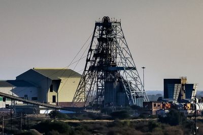 The death toll from a mining tragedy in South Africa rises to 13 after a worker dies at a hospital