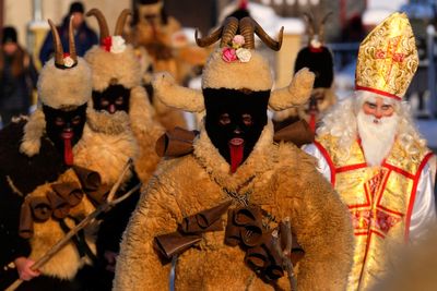 In some Czech villages, St Nicholas leads a parade with the devil and grim reaper in tow